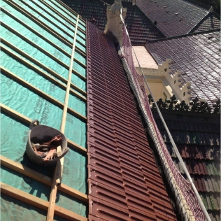 Rehabilitación de cubiertas inclinadas tradicionales de teja plana de un colegio