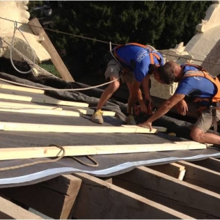 Rehabilitación de cubiertas inclinadas tradicionales de teja plana de un colegio